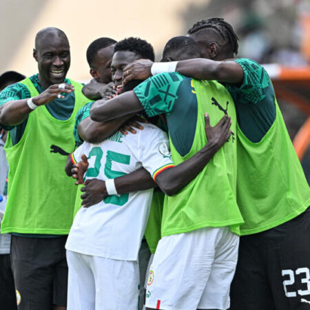 Senegal begins the defense of their title with a comfortable 3-0 victory over Gambia.