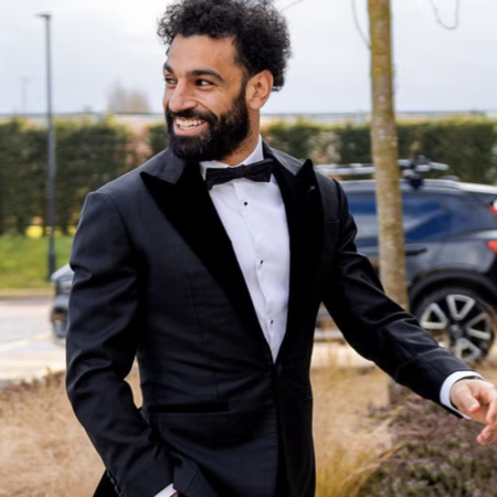 Why Salah, the Liverpool star, wears a suit?